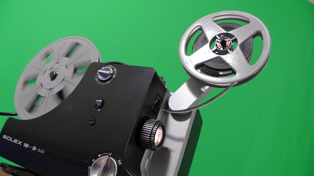 projector, cinema, reel, film, projection, movie collection, amateur movies, archive, green background, movie, light, former, devices, canvas, picture, actors, 8mm, collection